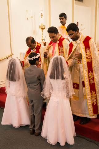 News Photo 3 - U.K. - Spiritual - first_holy_communian_in_the_year_of_mercy_in_bromley
