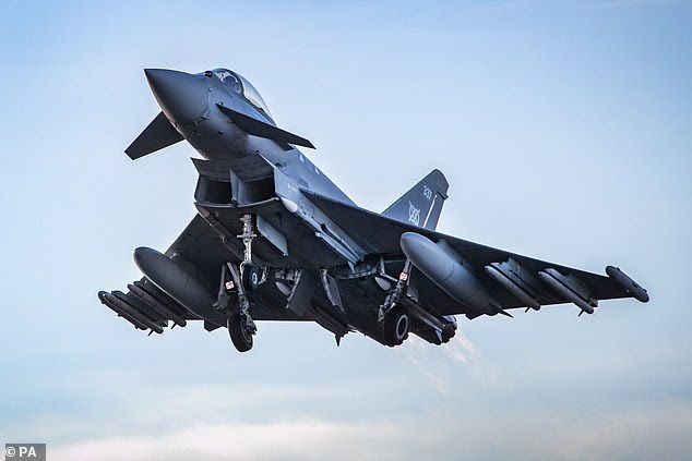 News Photo 1 - U.K. - Otta Nottathil - 31820204typhoon