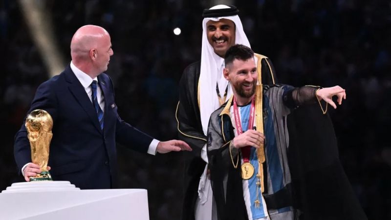 News Photo 1 - Gulf - Sports - forbidden_action_qatar_amir_overcoat_messi